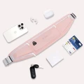 pol_pl_Saszetka-Pas-do-biegania-nerka-etui-na-telefon-sluchawki-Rozowy-76139_5.webp