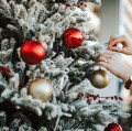cropped-hand-of-woman-decorating-and-hanging-royalty-free-image-1634654303.jpg